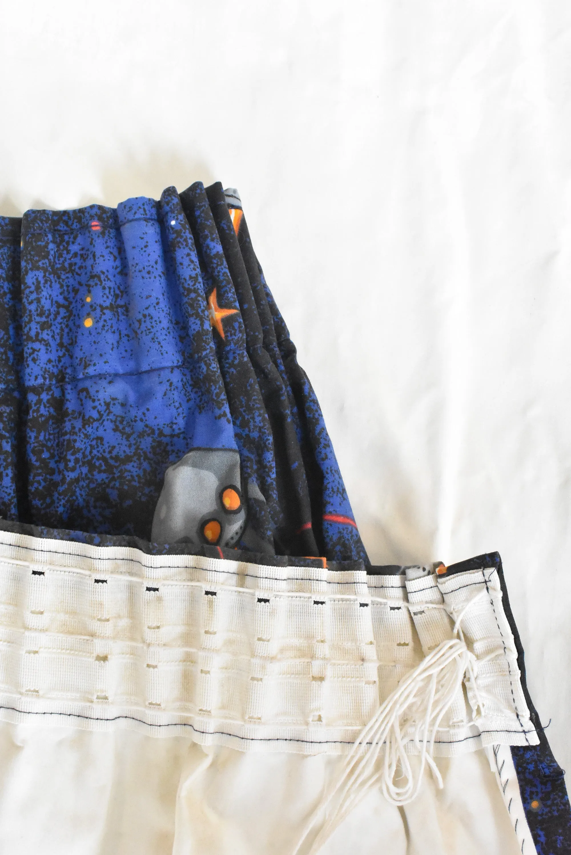 Pair of thermal 'Rocketman' curtains, 140cm x 155cm